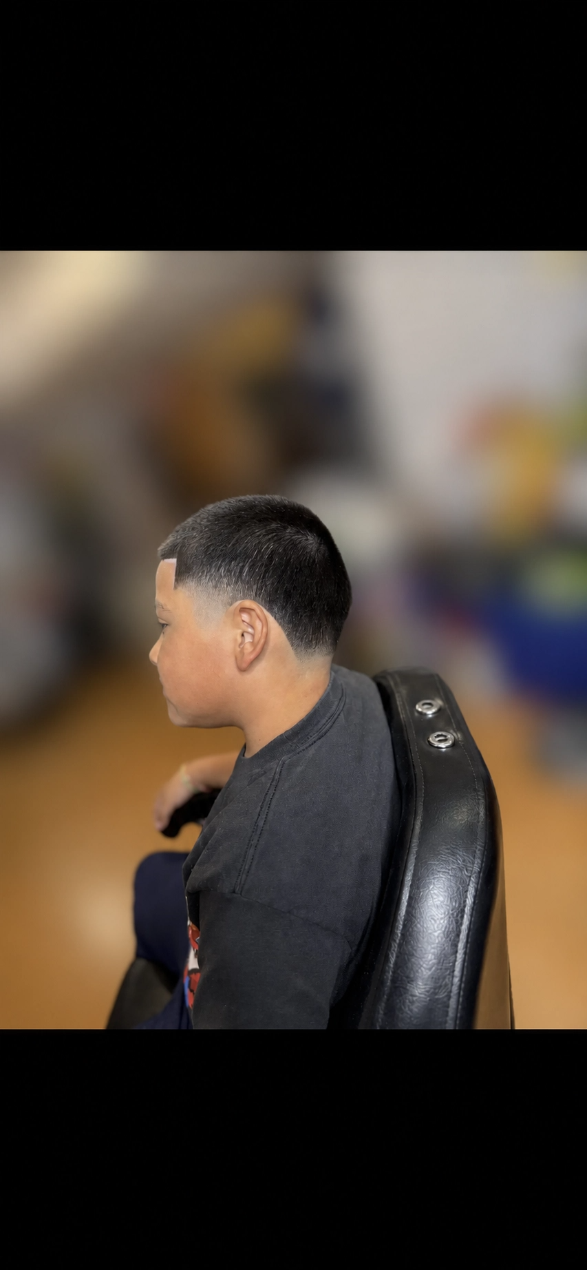 Low taper fade haircut on a young client by Almighty Cutz By Jesus.